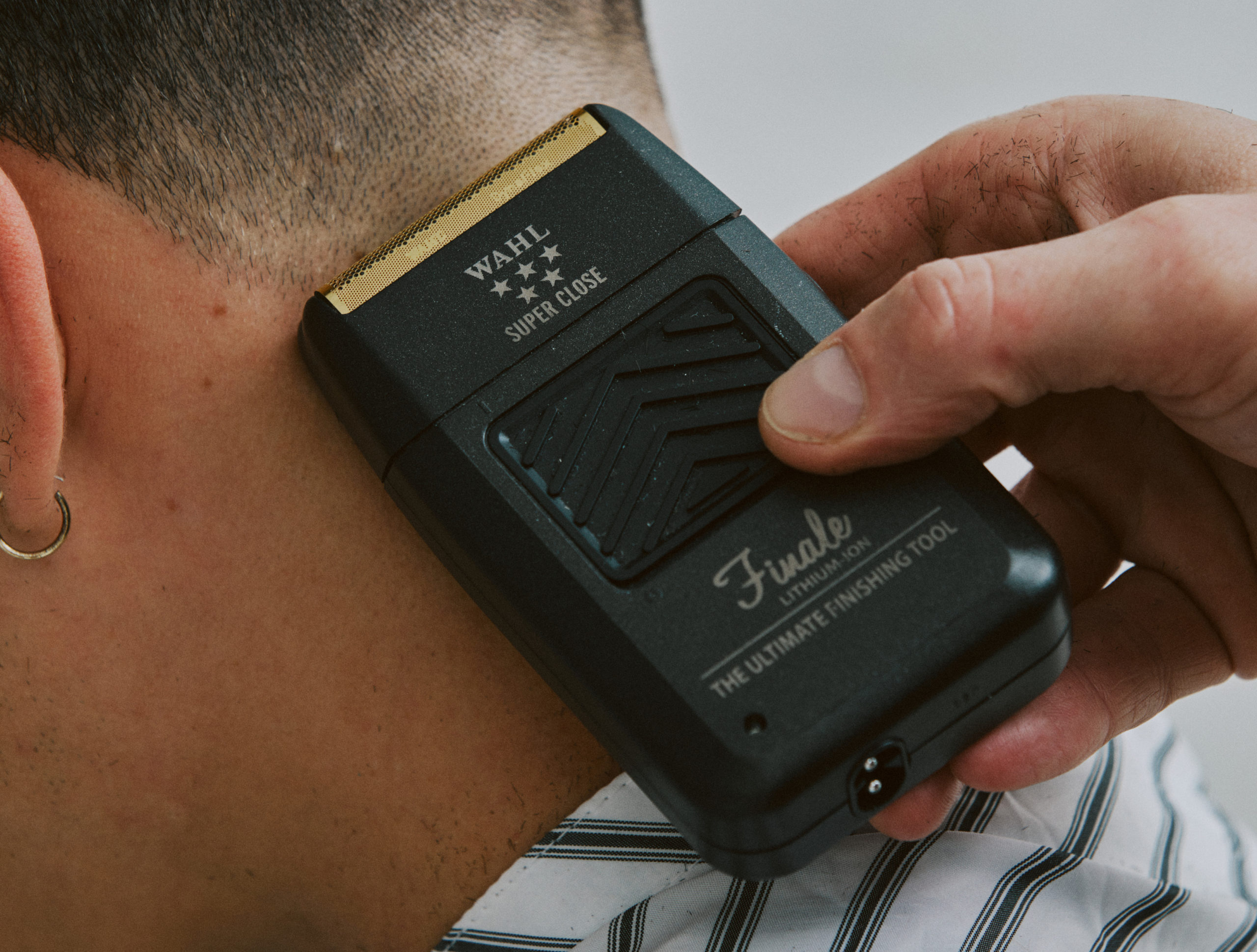 Man having head shaved